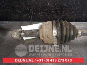Nissan Note Aandrijfas rechts-voor O576737 foto 2