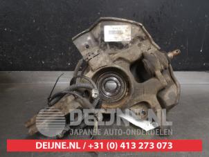 Kia Carens Achsschenkel links vorne O577015 foto 3