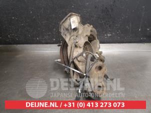 Kia Carens Achsschenkel links vorne O577015 foto 2