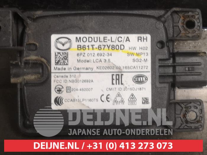 Mazda 3 Dode hoek sensor O577033