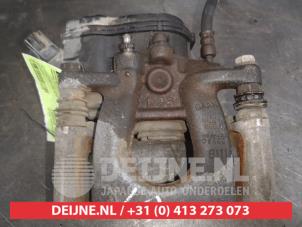 Mazda 3 Remklauw (Tang) links-achter O577035 foto 3