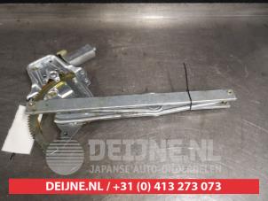 Toyota Yaris Window mechanism 4-door, front left O577568 photo 2