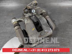 Hyundai Bayon Rear brake calliper, left O577704 photo 3
