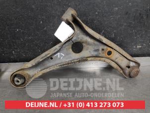 Toyota Yaris Front lower wishbone, left O577886 photo 2
