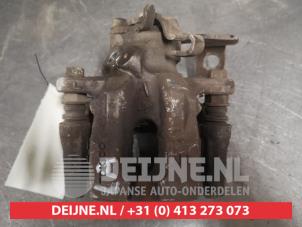 Subaru Trezia Bremszange links hinten O578540 foto 3