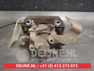 Subaru Trezia Bremszange links hinten O578540 foto 2