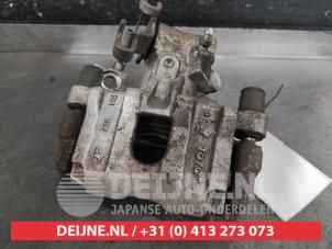 Toyota Yaris Bremszange rechts hinten O579068 foto 2