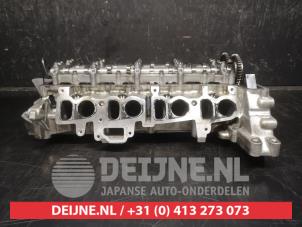 Toyota Avensis Cylinder head O579362 photo 4