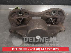 Kia Cerato Bremszange links vorne O579545 foto 2