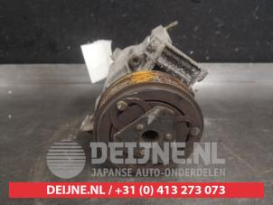 Gebruikte Pomp Airco Nissan Micra (K12) 1.6 16V 160 SR Prijs € 150,00 Margeregeling aangeboden door V.Deijne Jap.Auto-onderdelen BV