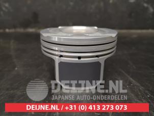 Zuiger van een Hyundai iX35 (LM) 1.6 GDI 16V 2012