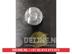 Zuiger van een Hyundai iX35 (LM) 1.6 GDI 16V 2012