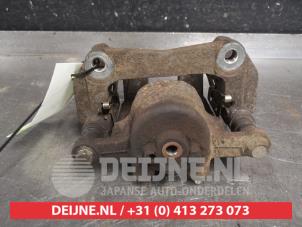 Mazda 2 Bremszange links vorne O579965 foto 2