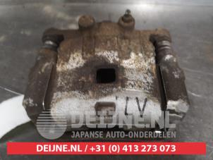 Mazda 2 Bremszange links vorne O579965 foto 3