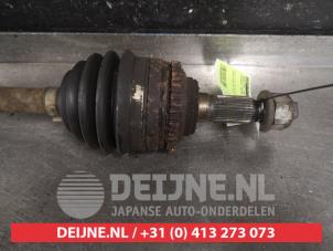 Chevrolet Tacuma Front drive shaft, left O580502 photo 3