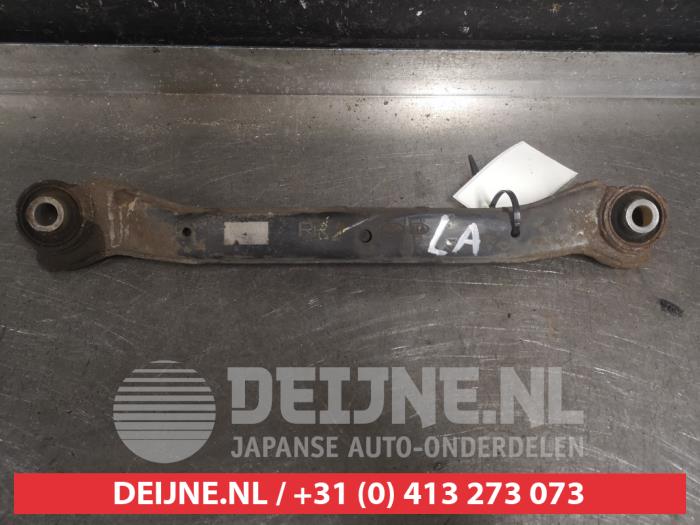 Kia Sportage Draagarm links-achter O580724