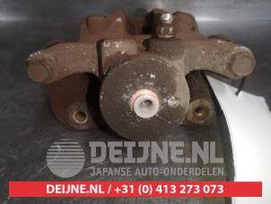 Kia Sportage Rear brake calliper, left O580718 photo 2
