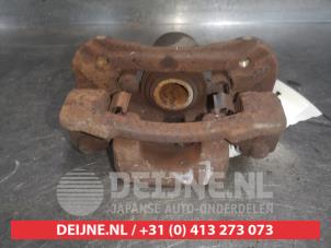 Kia Sportage Rear brake calliper, left O580718 photo 3
