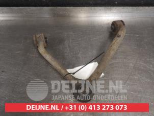Kia Sorento Front upper wishbone, left O580960 photo 2