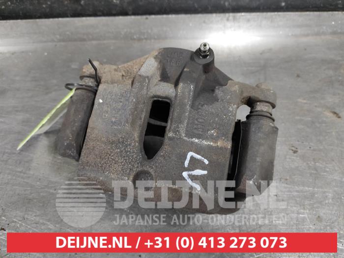 Hyundai IX35 Remklauw (Tang) links-voor O581094