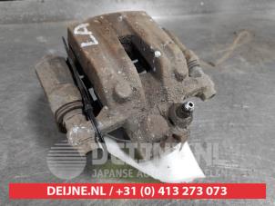 Hyundai IX35 Rear brake calliper, left O581095 photo 3