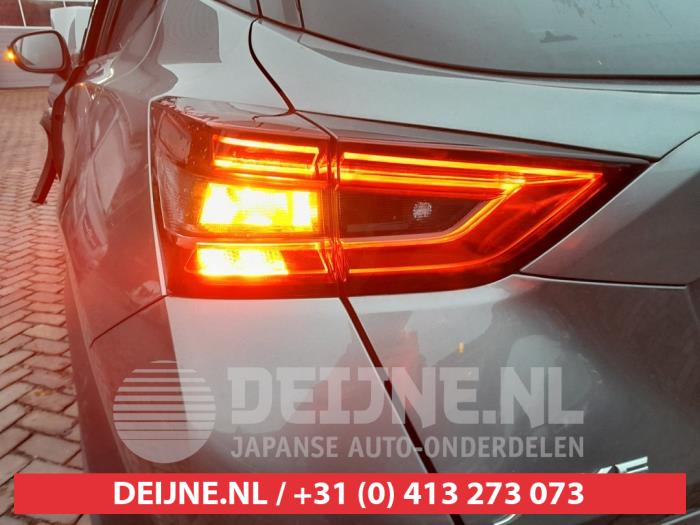 Nissan Juke Achterklep reflector links O581327