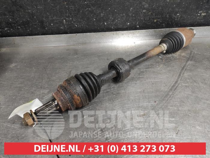 Subaru Justy Aandrijfas rechts-voor O581656