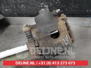 Nissan Pixo Front brake calliper, left O582396 photo 2