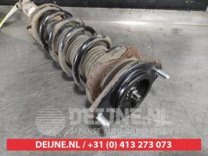 Subaru Outback Schokdemperpoot links-achter O583138 foto 2