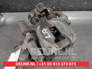 Subaru Outback Remklauw (Tang) links-achter O583151 foto 2