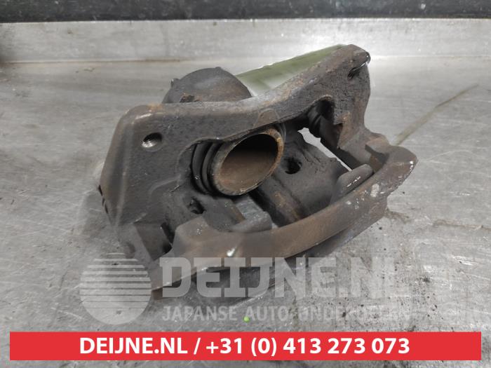 Mitsubishi Colt Remklauw (Tang) links-voor O583428