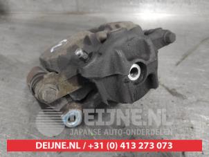 Mitsubishi Colt Front brake calliper, left O583428 photo 3