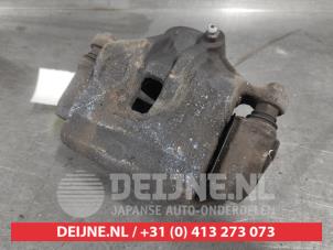 Hyundai IX20 Front brake calliper, left O583488 photo 2
