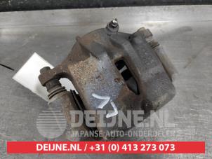 Kia Sportage Bremszange links vorne O583754 foto 2
