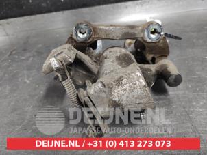 Toyota Yaris Bremszange rechts hinten O583990 foto 2