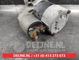 Nissan Almera Tino Starter O584018 photo 2