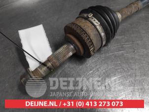 Nissan Almera Tino Front drive shaft, left O584022 photo 2