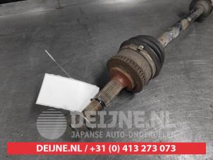 Nissan Almera Tino Antriebswelle rechts vorne O584023 foto 2