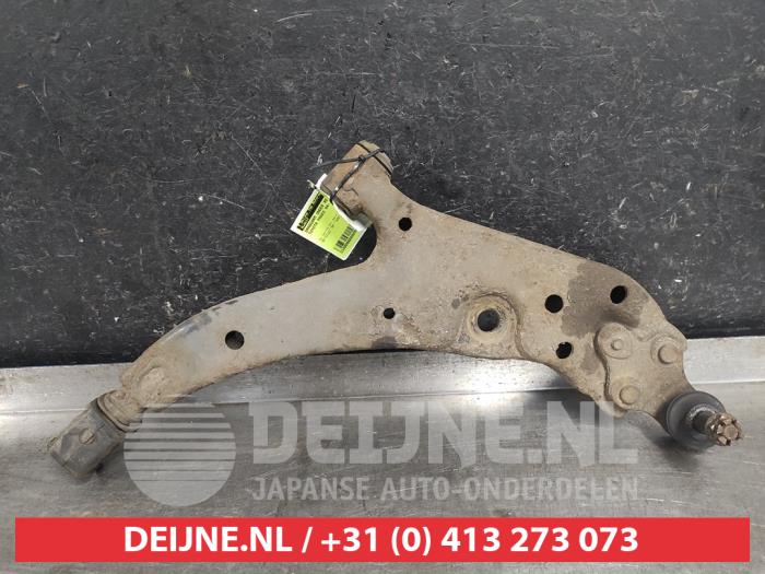 Toyota Paseo Front lower wishbone, right O584610