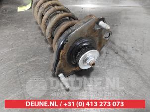 Toyota Corolla Verso Schokdemperpoot links-achter O585057 foto 2