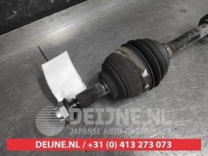 Nissan Micra Antriebswelle links vorne O586229 foto 2
