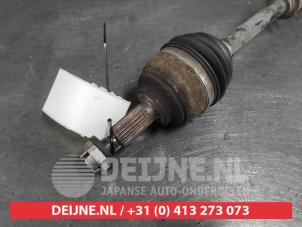 Nissan Micra Aandrijfas rechts-voor O586230 foto 2