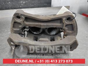 Nissan Navara Remklauw (Tang) links-voor O586534 foto 2