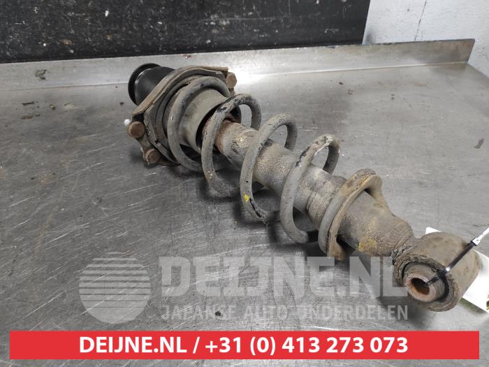 Toyota Celica Schokdemperpoot links-achter O587183