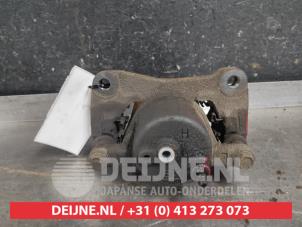 Toyota Celica Bremszange links vorne O587187 foto 2