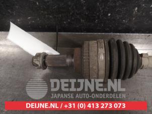 Suzuki Alto Aandrijfas links-voor O587415 foto 2