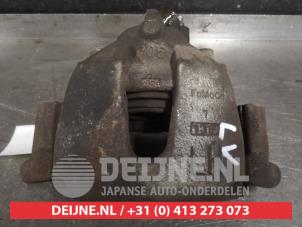 Mazda 5 Front brake calliper, left O587451 photo 2