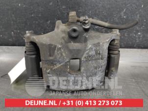 Mazda 3 Bremszange links vorne O587607 foto 3