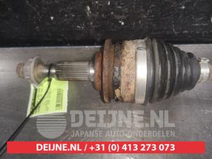 Suzuki Swift Aandrijfas links-voor O589120 foto 2