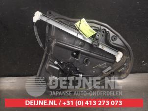 Mazda 2 Fenstermechanik 4-türig links hinten O589744 foto 2